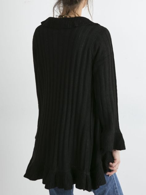 Ruffled black sweater.